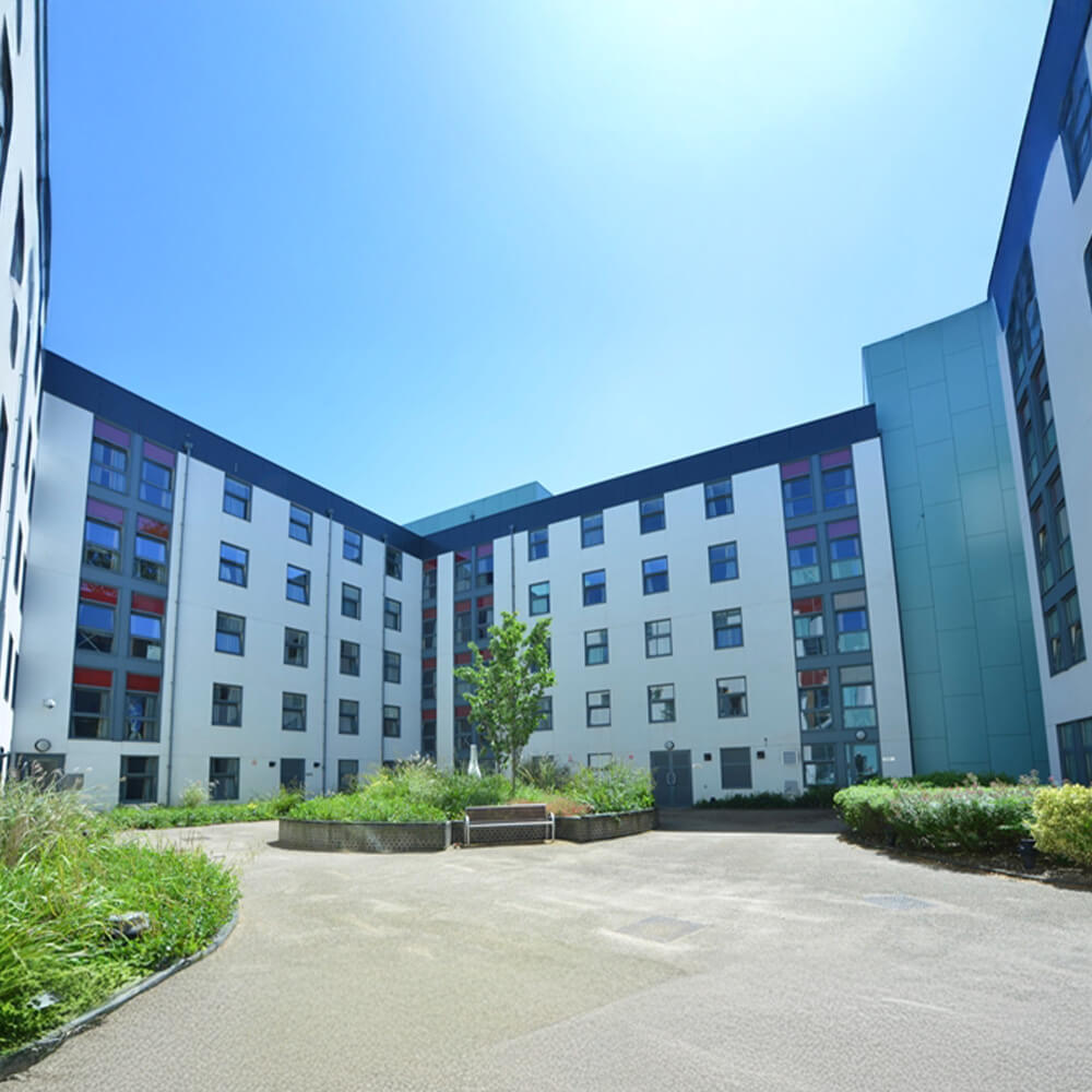 Modern dormitory area and green garden detail at St George's University.